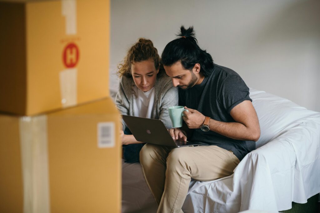 Photo of a couple moving into a new home