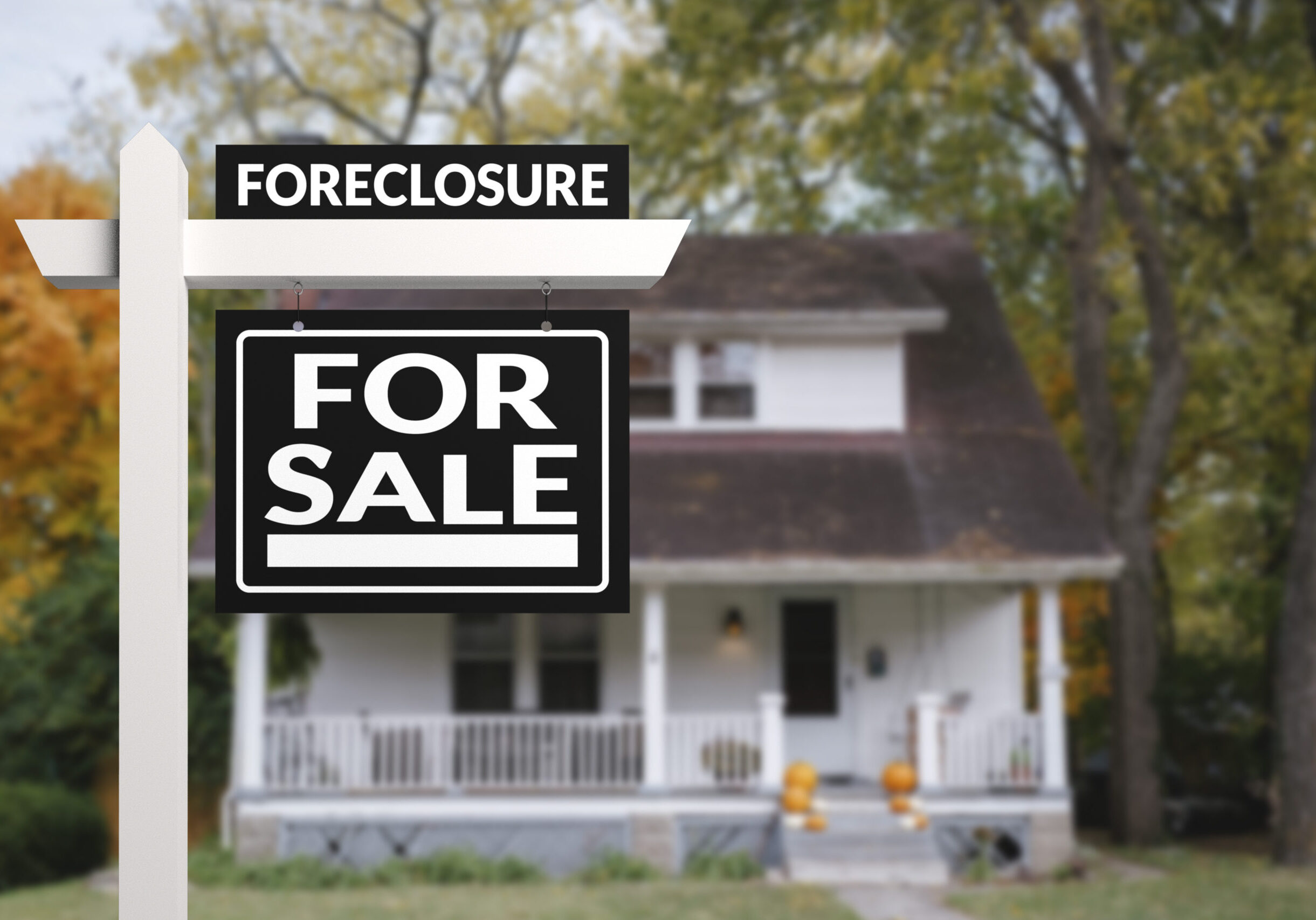 Black Foreclosure Home For Sale Real Estate Sign in front of an quaint countryside home.